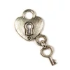Kép 2/2 - Charm fémdísz, 4 db - szív lakat kulccsal, 3D